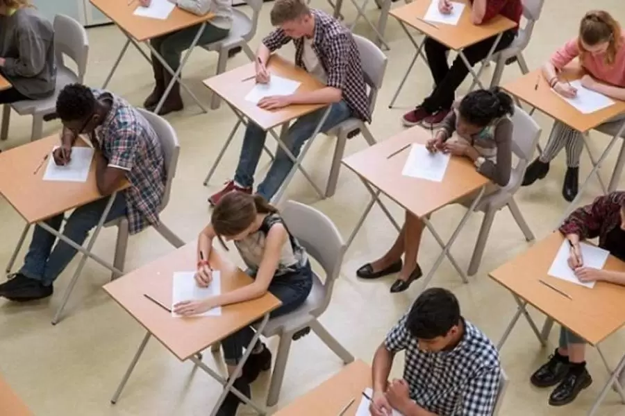 GCSE students in their exam hall, doing their GCSE exams | Teachers To your Home